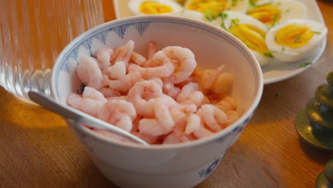 bowl of fresh pink shrimps for seafood appetizer