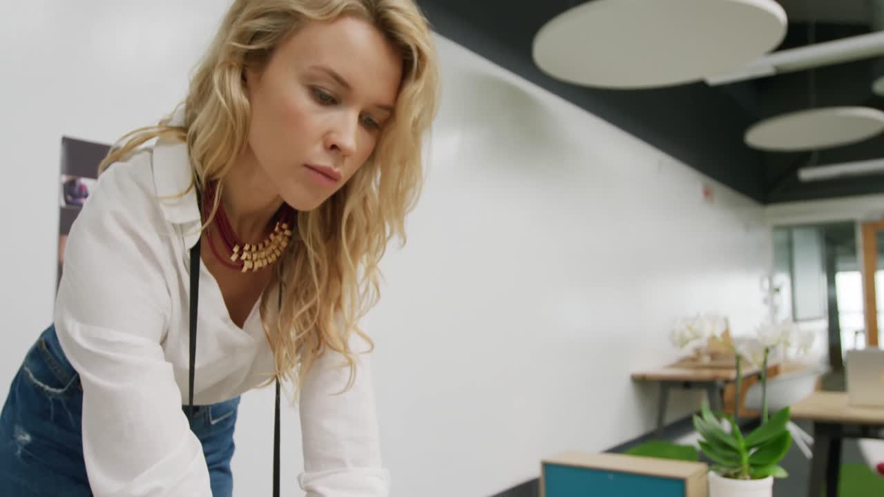 Young woman working in a creative office