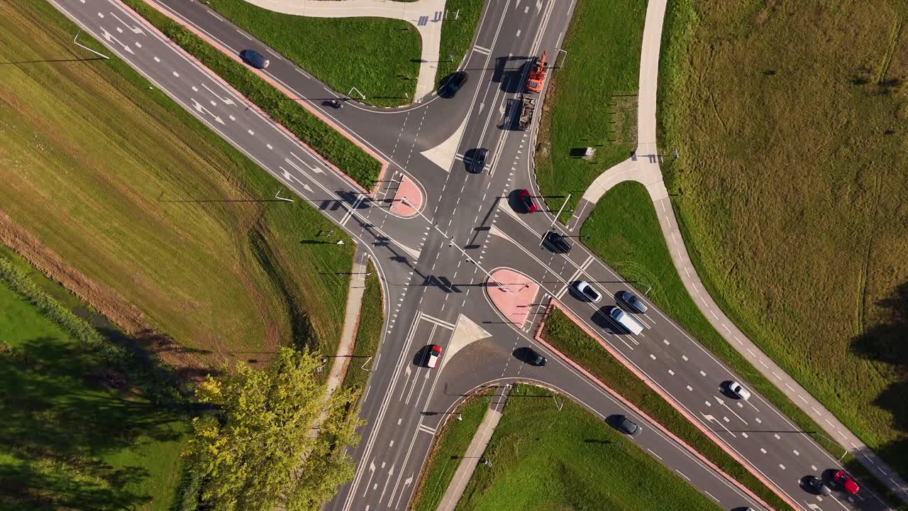 Aerial View of Road Intersection with Cars