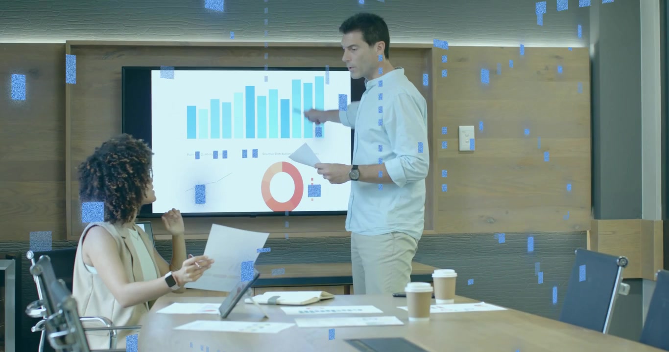 Business analyst passing chart animating bar pie charts while colleague highlighting data trends