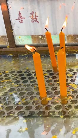 burning candles in a temple