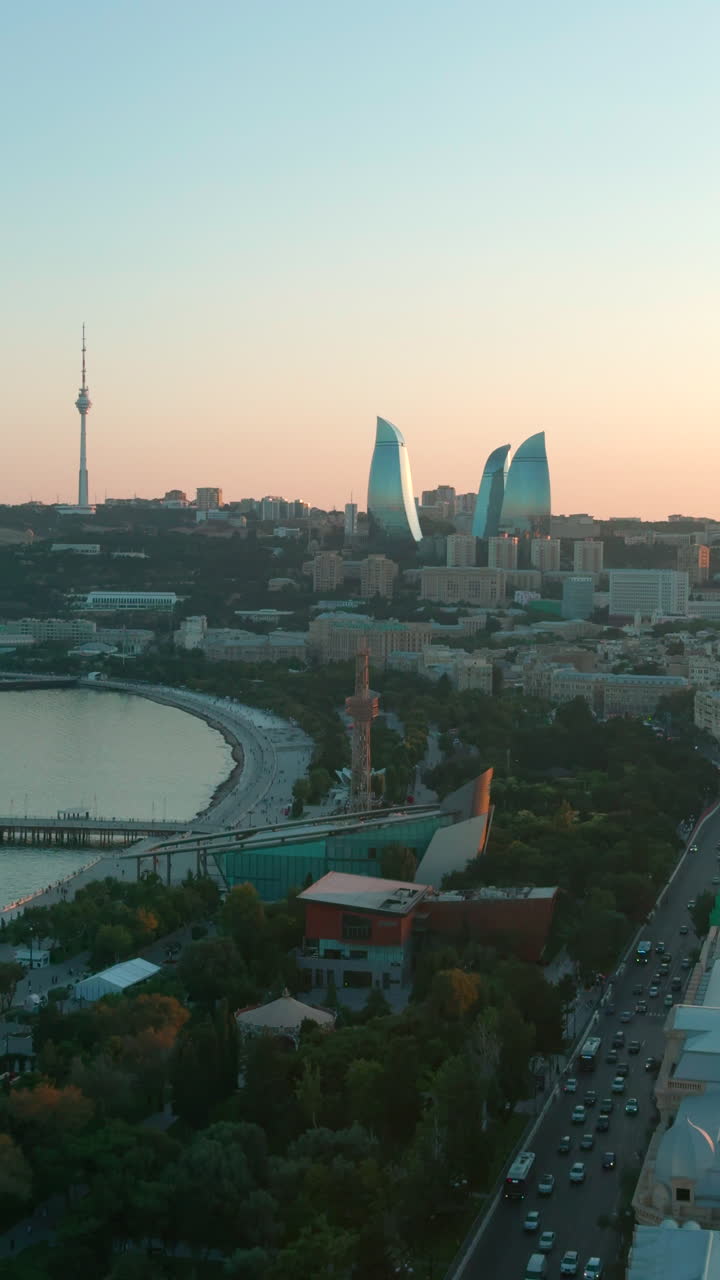 Vertical Shot of Baku City and Traffic with the Flame Towers at Dusk