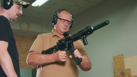 stressed student prepares for the first shot of the rifle at the shooting range