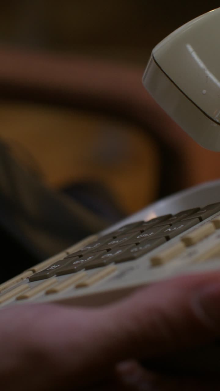 Person Using an Old-Style Rotary Phone