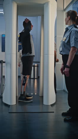 airport security check with person with prosthetic leg