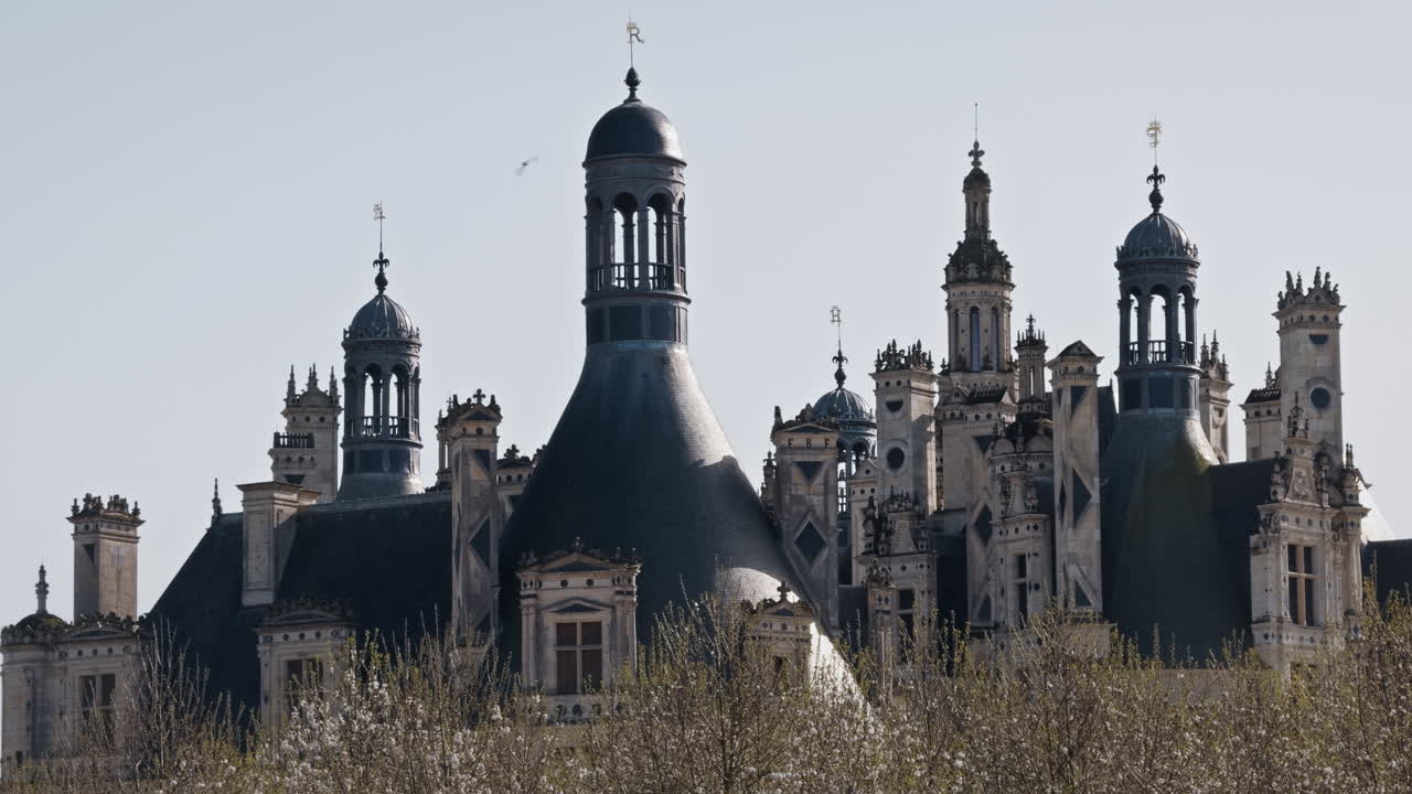 Majestic view of Château de Chambord with towers and Renaissance-style turrets