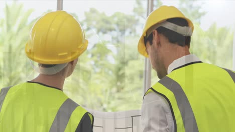 animation of statistics processing over male and female architects talking at construction site