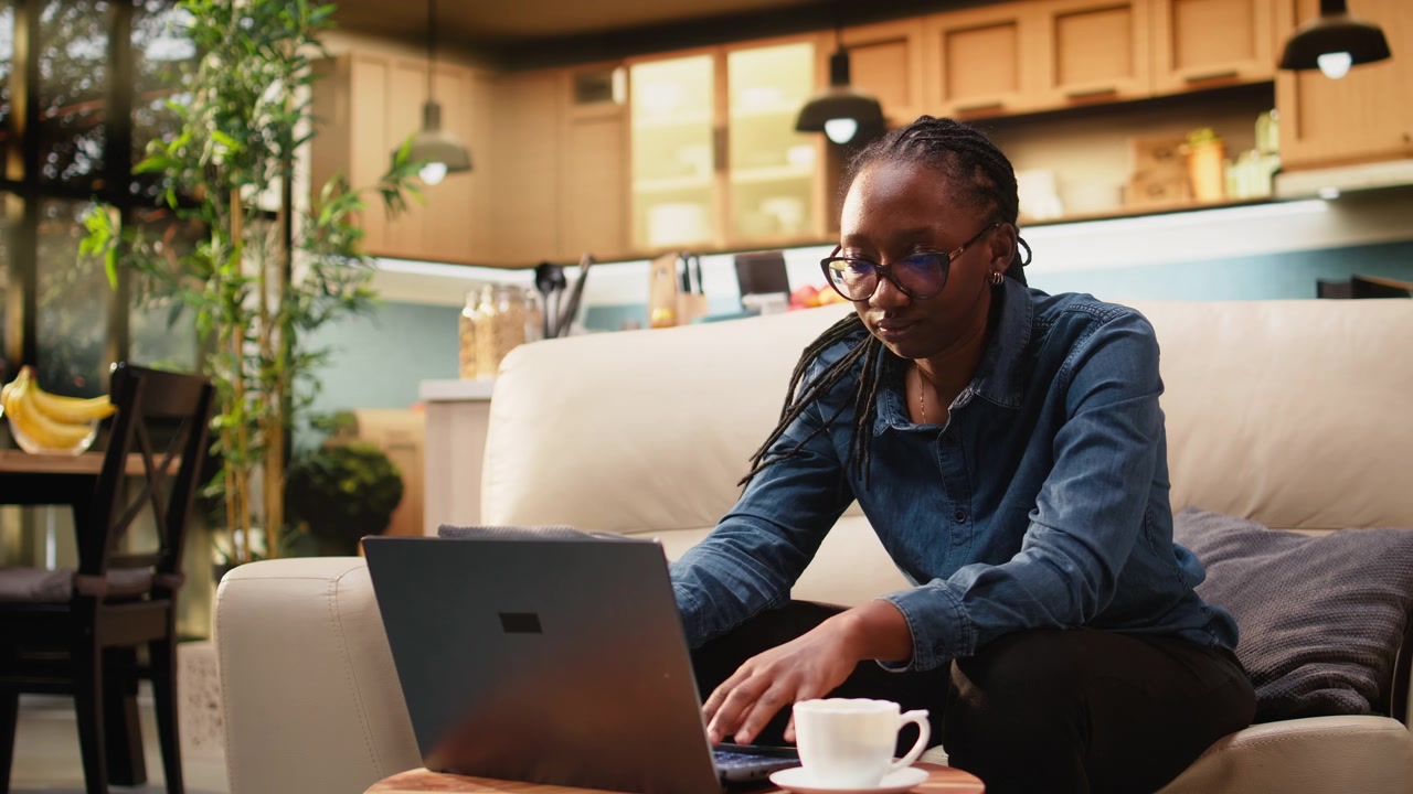 Overwhelmed woman receiving bad news during remote work