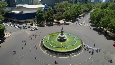 drone-shot-of-diana-huntress-roundabout-with-cyclists-exercising