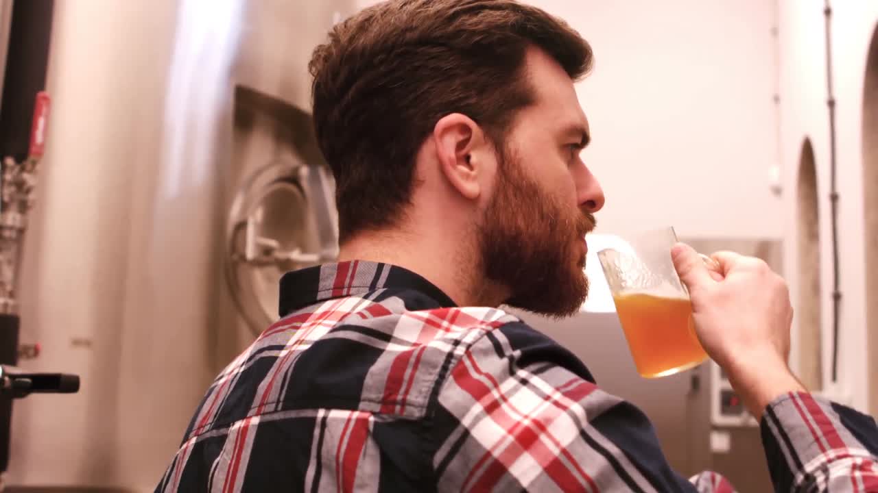 Brewer testing beer