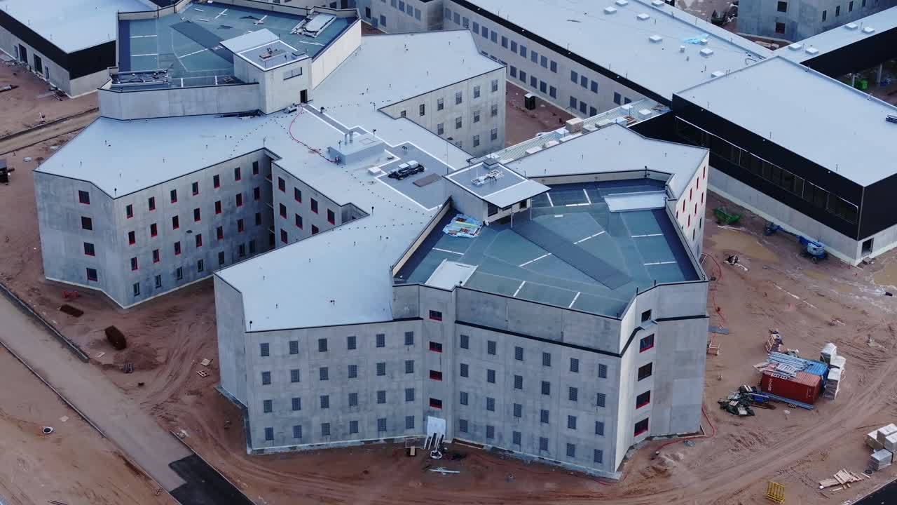 Modern prison facility in development, highlighting secure infrastructure layouta