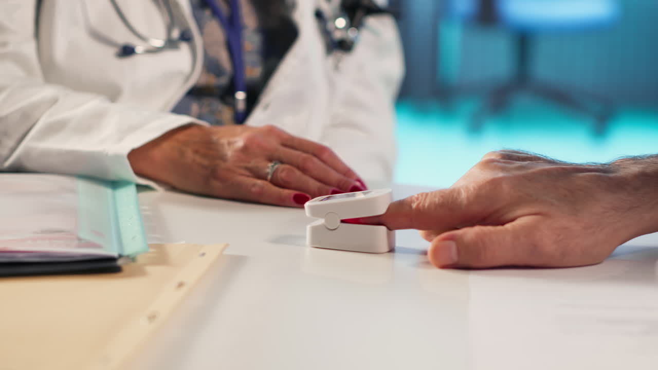 Vertical Video Female healthcare professional uses an oximeter to measure the oxygen levels