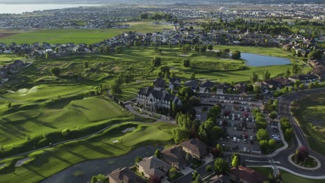 sleepy ridge golf course in beautiful vineyard, utah at sunset - aerial tilt-up reveal