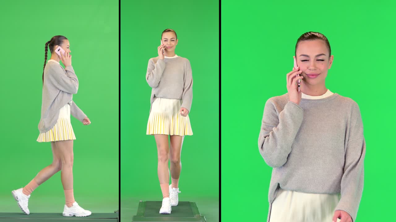 테니스 옷을 입은 젊은 미소 짓는 스포츠 여성이 녹색 스크린, 크로마 키에서 는 동안 휴대 전화로 이야기하고 있습니다.