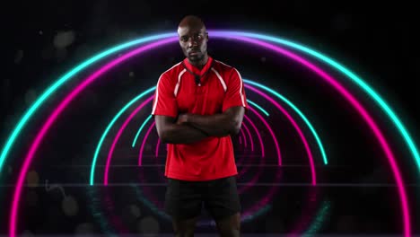 animation of portrait of african american sportsman over pink and blue neon arcs