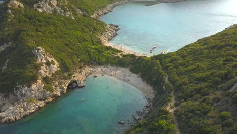 porto timoni beach crystal clear water ionian greek island corfu aerial orbit