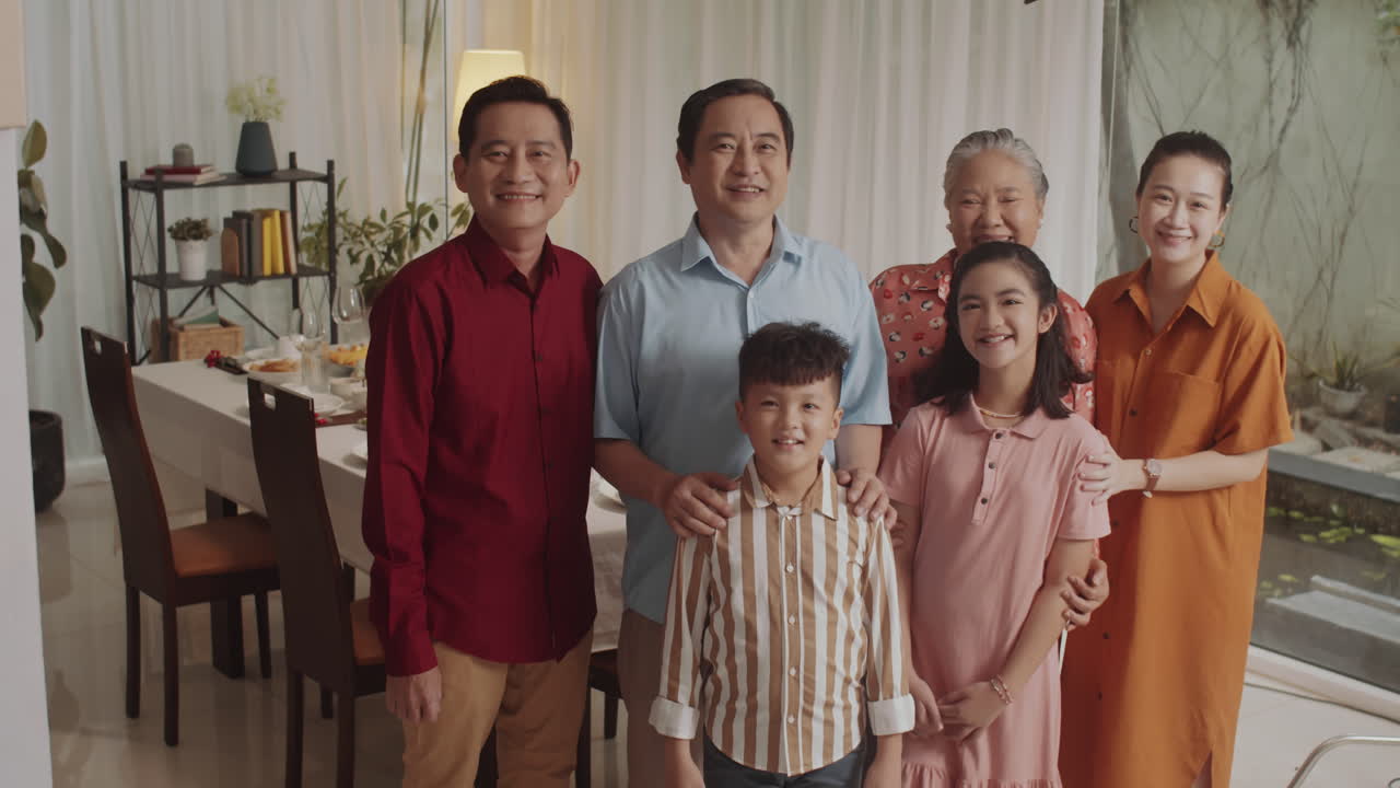 Portrait of Multi-generational Asian family Gathering for Dinner