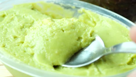 Avocado-spread-on-a-chopping-board-,