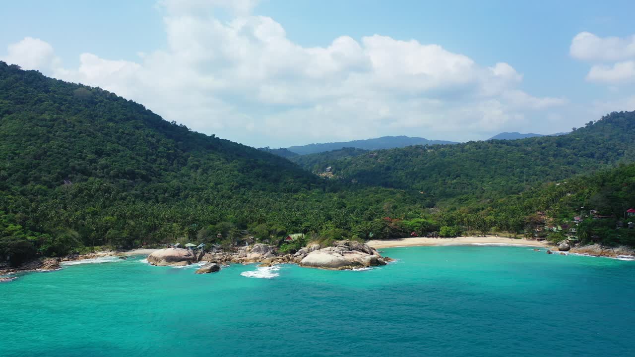 Small secluded sandy beaches surrounded by tropical jungle