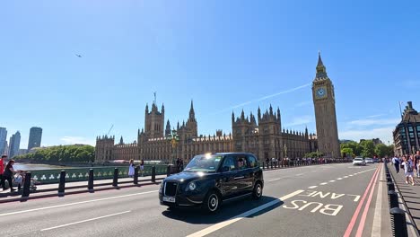 double-decker bus passing big ben in london