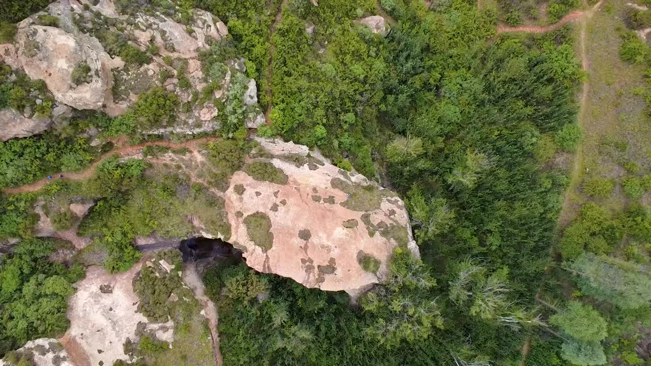 Stunning aerial view of a rocky outcrop on a Clarens, Free State hiking trail. Ideal for nature, adventure, and scenic projects