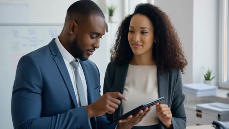 business colleagues collaborating with a tablet