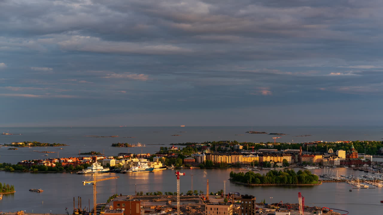 Time lapse of day turning into night, clouds moving over Katajanokka, Helsinki