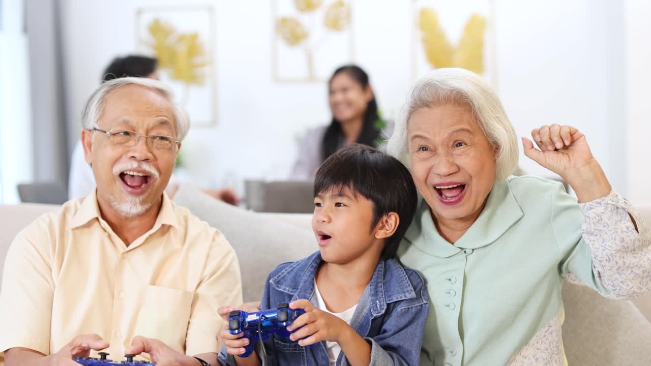 Grandparents and grandchild enjoy a video game together, creating joyful memories in a cozy living room setting