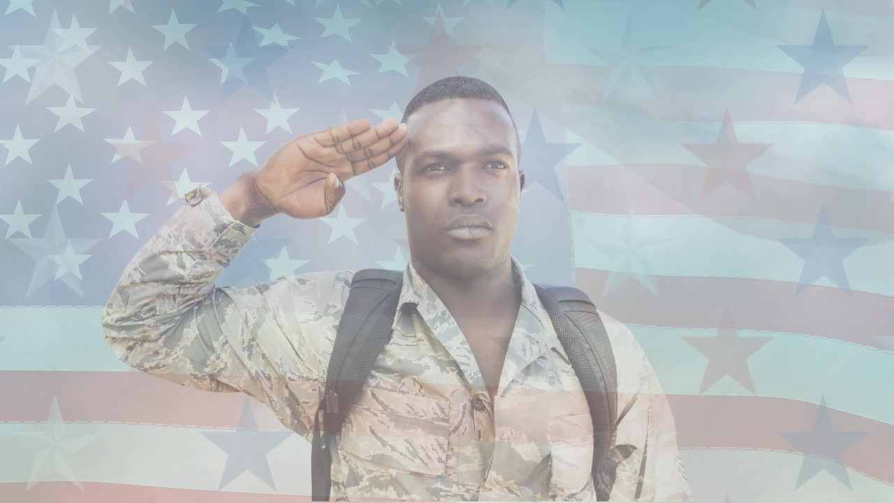 Animation of male soldier saluting moving over american flag
