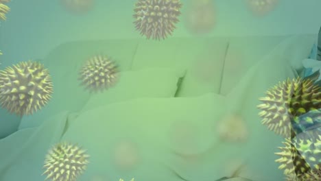 Animation-of-virus-cells-over-midsection-of-african-american-patient-in-bed