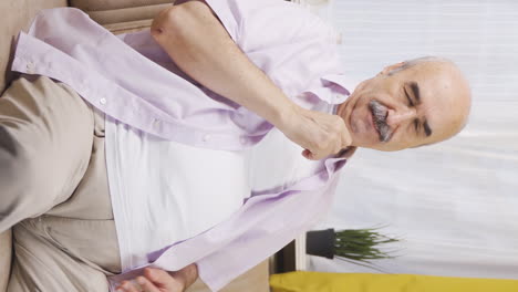 Vertical-video-of-Muslim-old-man-praying.