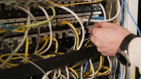 technician configures the network equipment in the server room