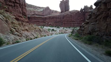 POV-footage-of-driving-in-the-Arches-National-Park-in-Moab,-Utah
