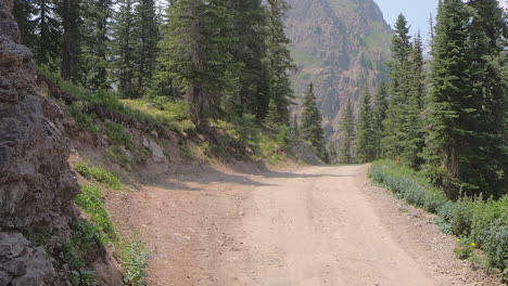 POV-driving-on-4WD-trail-cut-through-the-San-Juan-Mountains-in-Colorado