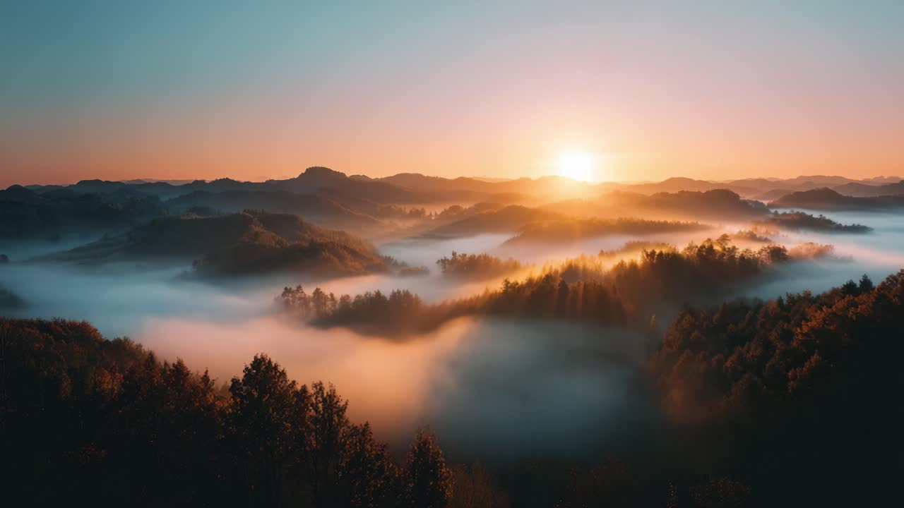 A Breathtaking Dawn Over Misty Mountains: Capturing the Serene Beauty of Sunrise Illuminating Scenic Landscape with Soft Fog and Vibrant Colors