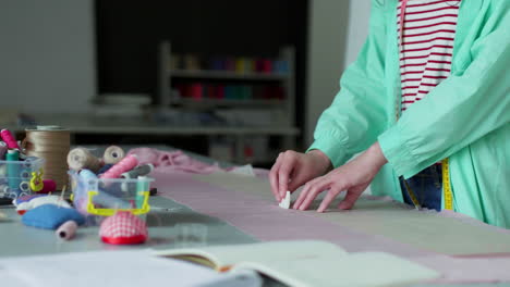 dressmaker working in her studio.