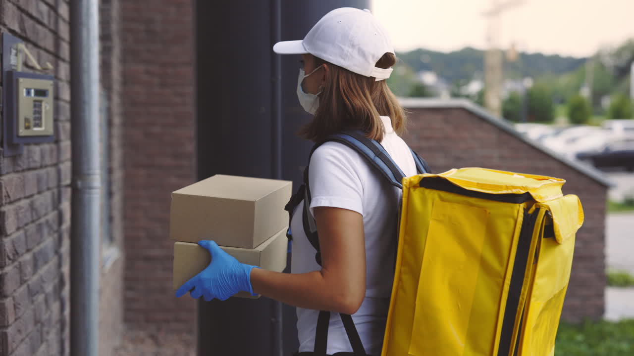 Delivery Person Leaving Packages at the Door