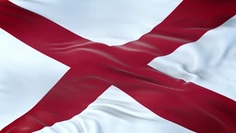 alabama (u.s. state) flag waving in the wind with highly detailed fabric texture. seamless loop