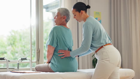 women, physiotherapist and back rehabilitation