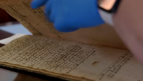 looking through old 1800s documetns or ledgers historical museum and research library for the ontario county research society in canandaigua new york