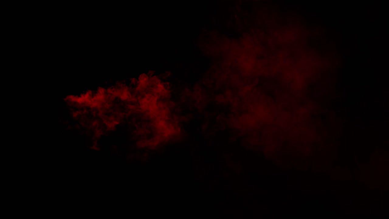 Red mist and blood swirls and flows slowly on a black background. Ideal overlay for bloody horror films, dramatic intros, atmosphere of danger or passion