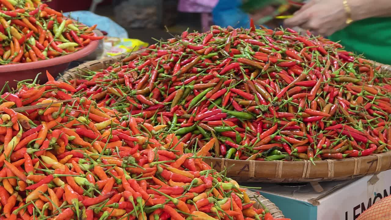 Red Chilli For Sale At The Market. - closeup shot
