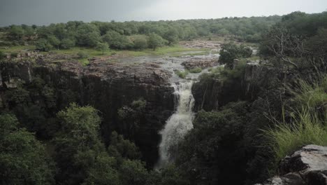 waterfall flowing in a forest of madhya pradesh , india