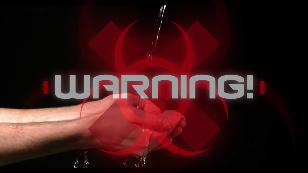 단어 경고! 검은 바탕에 손을  ⁇ 는 사람 위에 건강 위험 표지판 위에 쓰여져 있습니다.