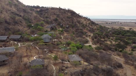 a stunning view of the sangaiwe tented lodge overlooking the impressive tarangire national park in tanzania in north africa