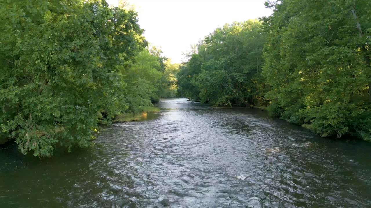 Aerial flyover flowing creek water, Ohio