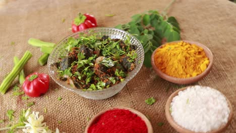 rotating healthy vegan dish curry- moringa leaves and flowers curry roast