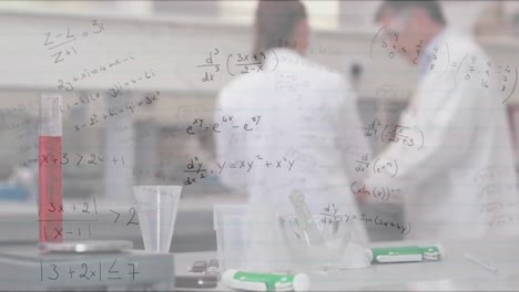 Animation-of-mathematical-equations-over-diverse-male-and-female-scientists-working-at-laboratory