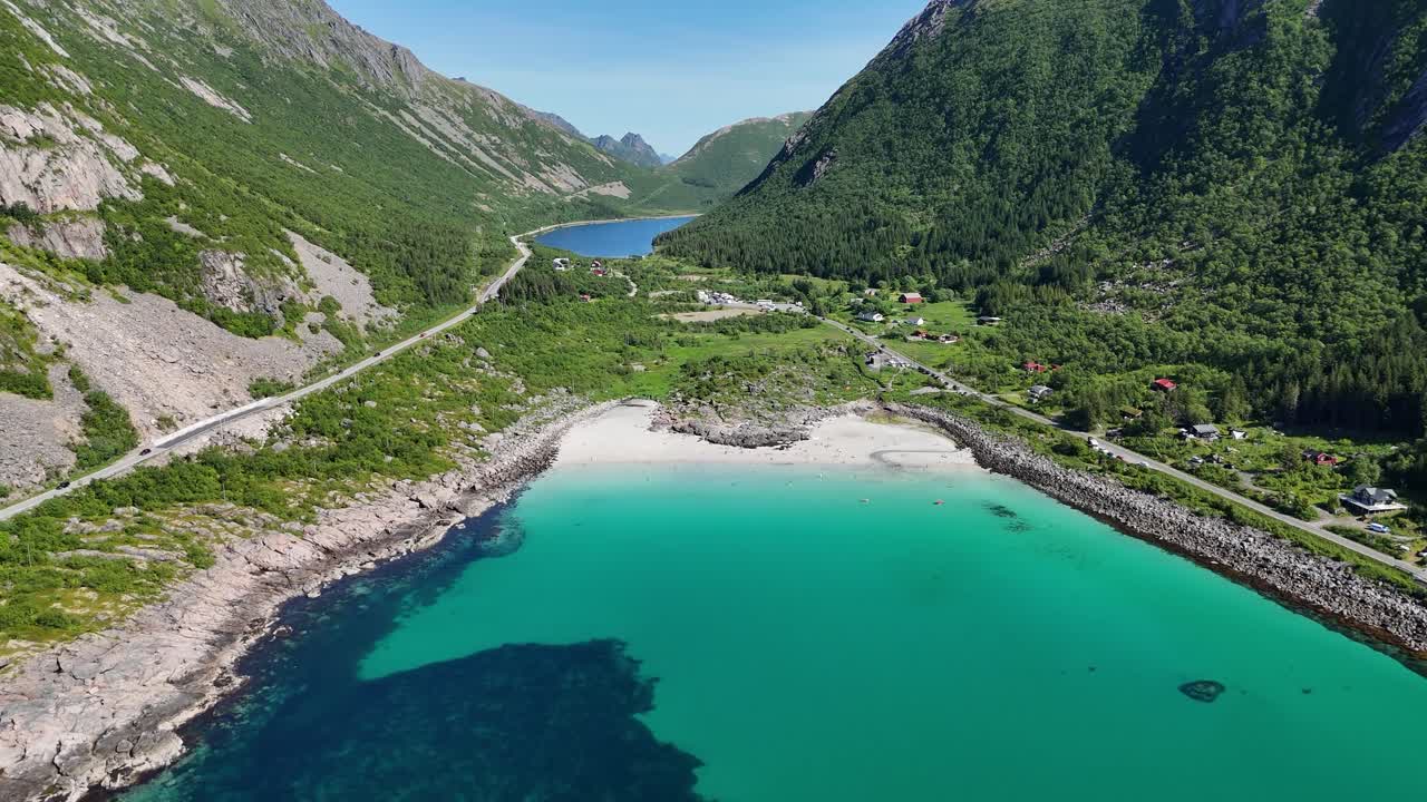 Aerial view of the exotic Rørvikstranda Beach in the Lofoten Islands, Norway, captured during summer. A surprising touch of tropical beauty in the far north