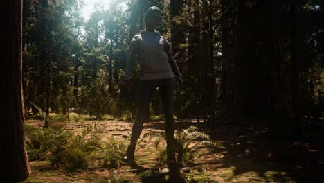 mujer en el parque nacional yosimite cerca de la secuoya